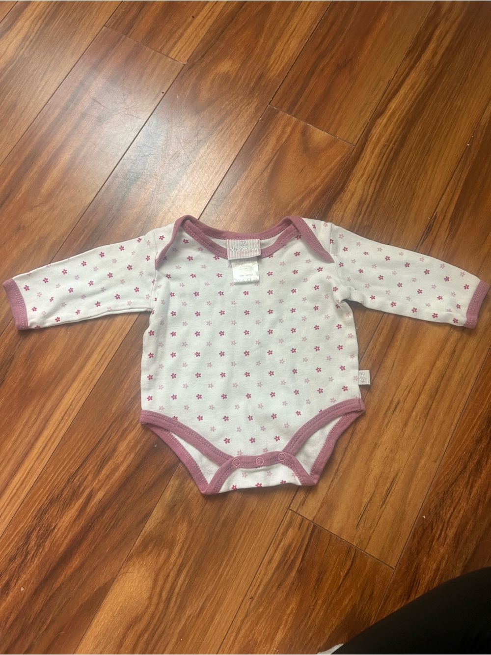 Long-Sleeve White Baby Bodysuit with Pink Floral Trim